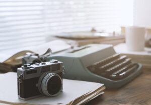 Writer and journalist vintage desktop with typewriter